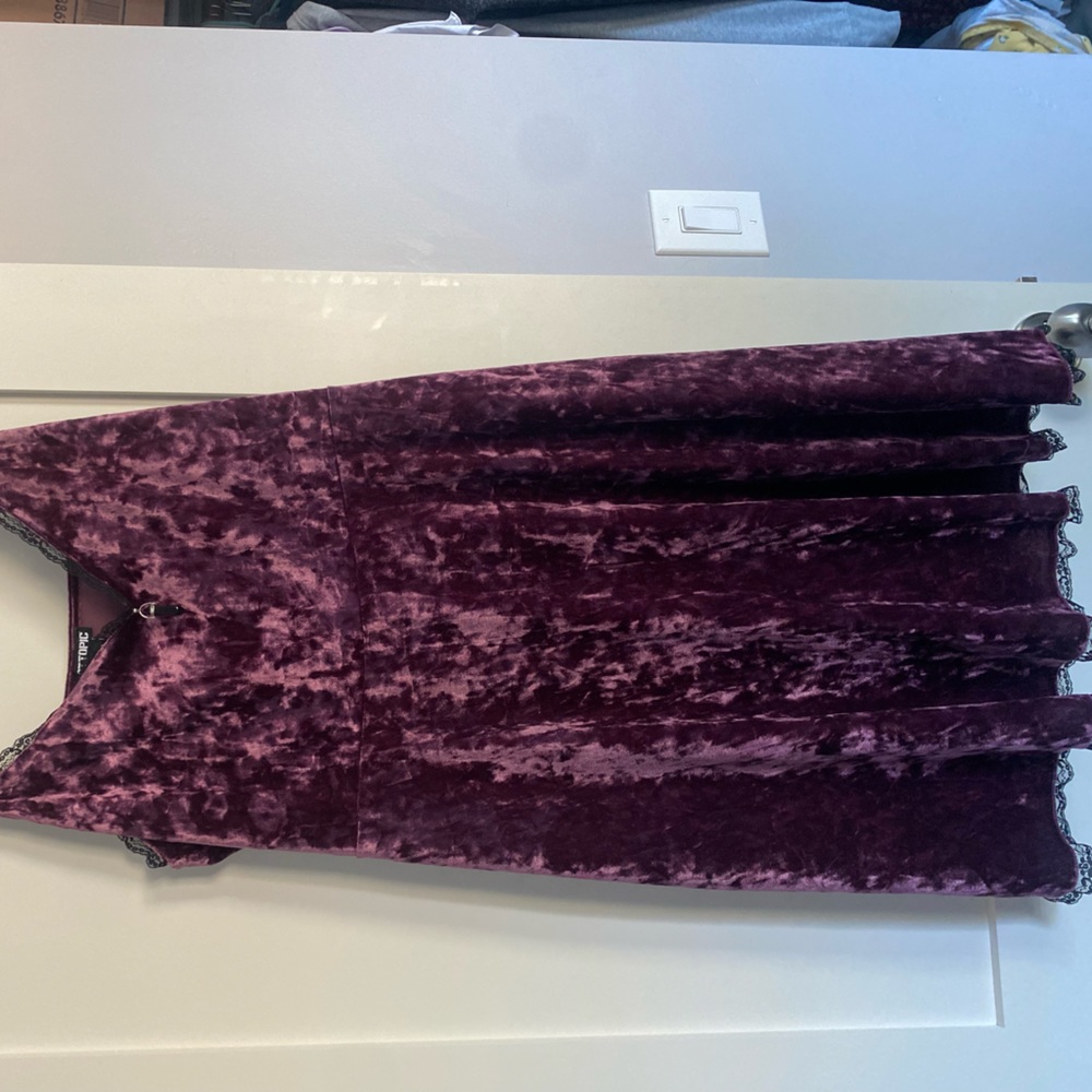 Purple velvet dress with crystal and lace detailing. Size is plus size 2.